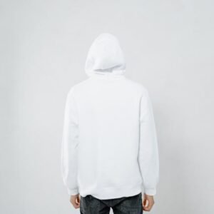Person wearing a white hoodie facing away against a plain backdrop, offering blank space.